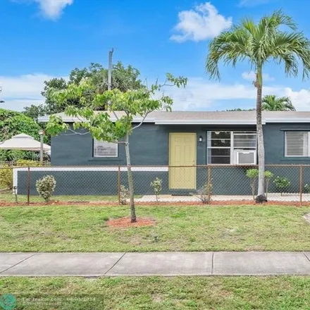 Buy this 3 bed house on 4141 Nw 10th Ter in Fort Lauderdale, Florida