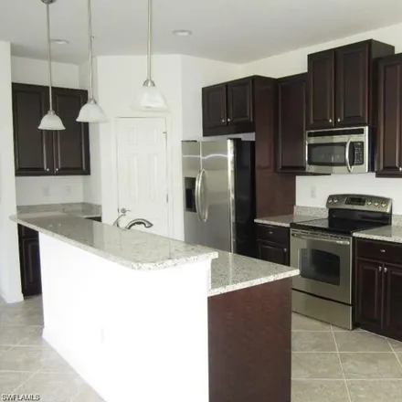 Rent this 2 bed condo on 23462 Alamanda Drive in Shadow Wood, Lee County