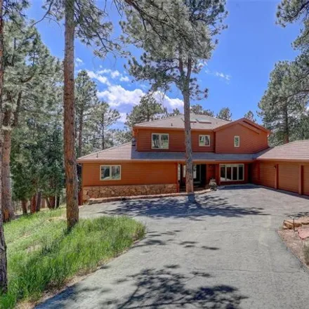 Buy this 5 bed house on 25600 Bristlecone Court in Jefferson County, CO 80401