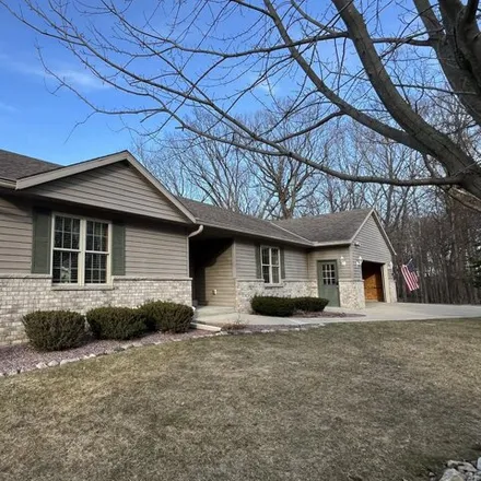 Buy this 3 bed house on 1198 Woods Edge Drive in Hartford, WI 53027