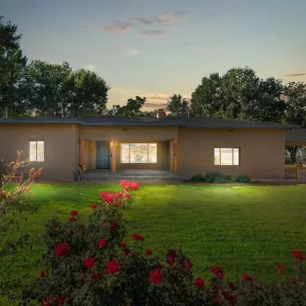 Buy this 3 bed house on 1128 El Pueblo Road Northwest in Los Ranchos de Albuquerque, Bernalillo County