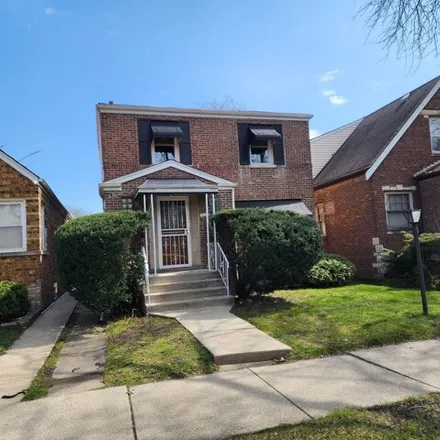 Buy this 3 bed house on 10231 South Rhodes Avenue in Chicago, IL 60628