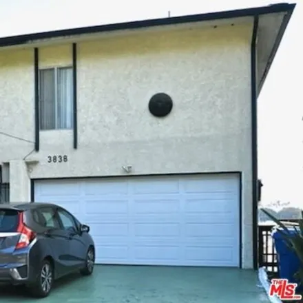 Buy this 1studio townhouse on 3837 Montclair Street in Los Angeles, CA 90018