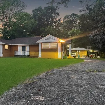 Buy this 4 bed house on 2466 North Hibiscus Road in Radium Springs, Dougherty County