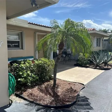 Rent this 3 bed house on 1082 Southeast 14th Avenue in The Cove, Deerfield Beach