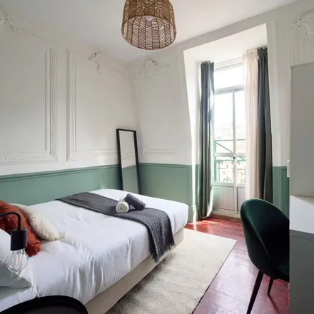Rent this 8 bed room on Rua Francisco Sanches