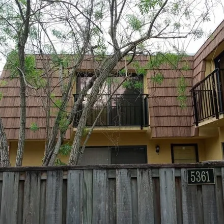Rent this 2 bed townhouse on 5365 Elm Court in Orlando, FL 32811