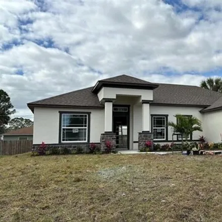 Buy this 4 bed house on 1038 Duxbury Road Southeast in Palm Bay, FL 32909