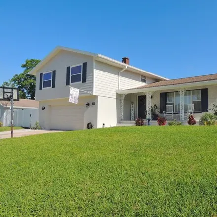 Buy this 4 bed house on 3625 Driftwood Drive in Titusville, FL 32780