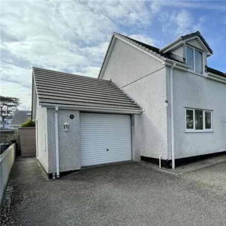 Buy this 4 bed house on Lôn Gwion in Benllech, LL74 8TJ