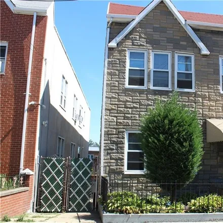 Buy this 6 bed townhouse on 1710 Fowler Avenue in New York, NY 10462