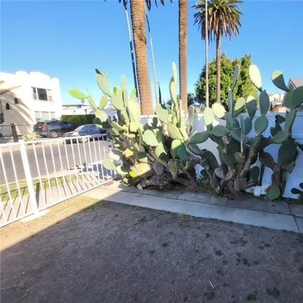 Buy this 3 bed house on 1240 South Muirfield Road in Los Angeles, CA 90019