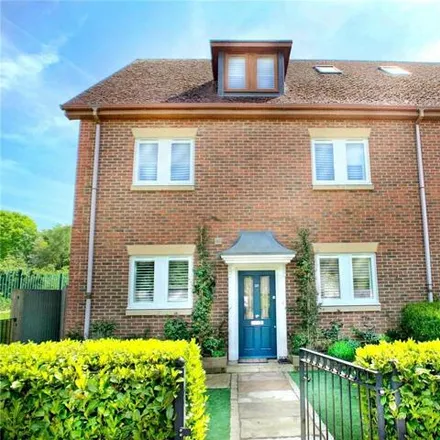 Buy this 4 bed townhouse on Lakeside Drive in Woking, GU24 8BD