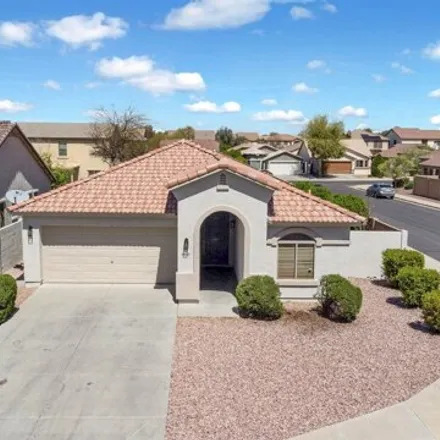 Rent this 4 bed house on 10038 W Veliana Way in Tolleson, Arizona