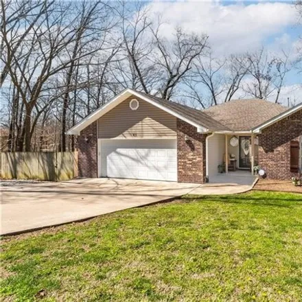 Buy this 4 bed house on 63 Reighton Dr in Bella Vista, Arkansas