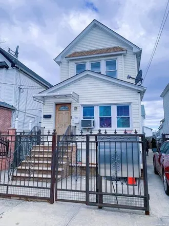 Buy this 4 bed house on 113-05 107th Avenue in New York, NY 11419