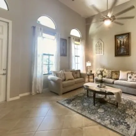 Rent this 2 bed apartment on #20-5,8997 Cambria Circle in Ole at Lely Resort, Naples