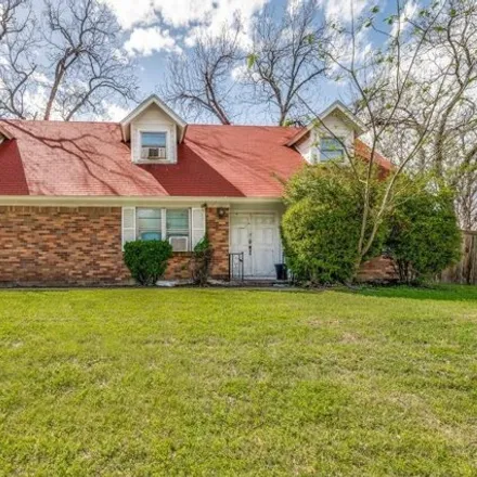 Buy this 4 bed house on 1705 Sylvan Drive in Arlington, TX 76012