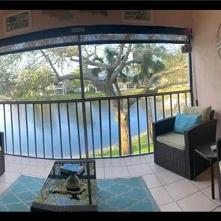 Rent this 2 bed condo on 755 Wiggins Lake Drive in Gulf Harbor, Collier County