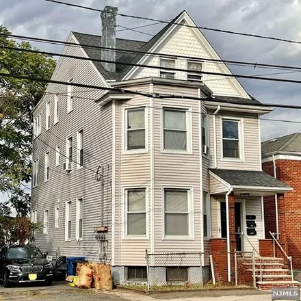 Buy this 7 bed townhouse on 38 5th Avenue in Paterson, NJ 07524
