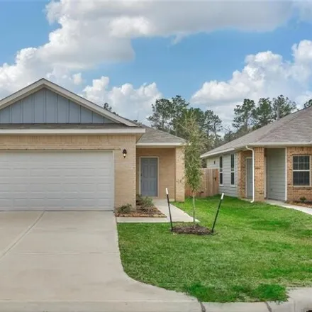 Rent this 3 bed house on Moss Lane in Montgomery County, TX 77365