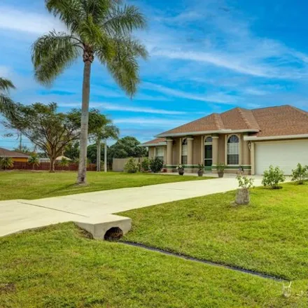 Buy this 3 bed house on 228 Southwest Undallo Road in Port Saint Lucie, FL 34953