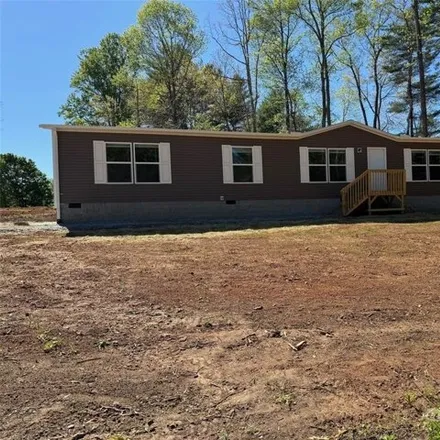 Buy this studio apartment on 157 Field Sparrow Lane in Henderson County, NC 28792