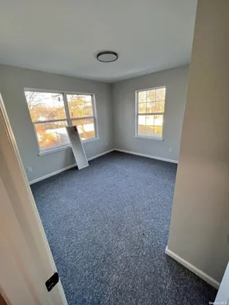 Rent this 4 bed house on 90 East Smith Street in North Amityville, NY 11701