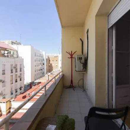 Rent this 8 bed apartment on Madrid in Calle de Guzmán el Bueno, 22