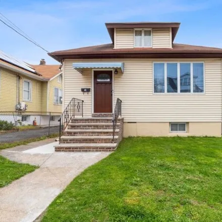 Buy this 4 bed house on 275 East 24th Street in Paterson, NJ 07514