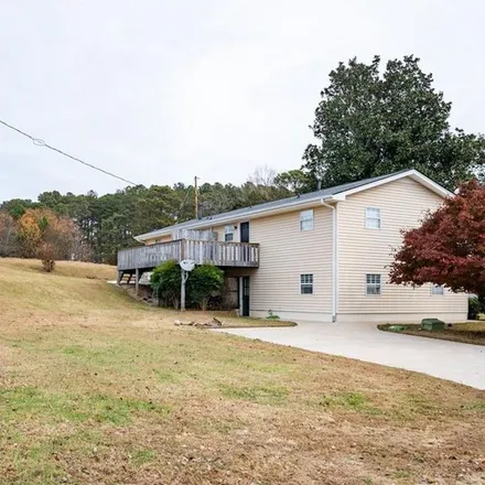 Rent this 2 bed apartment on Timberleaf Road in Holly Springs, GA 30115