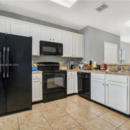 Image 1 - 1937 Chatham Place Drive, Meadow Woods, Orange County, FL 32824, USA - Townhouse for sale