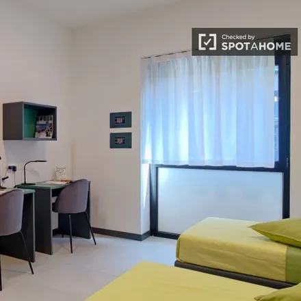 Rent this 9 bed room on Piazza Luigi Vittorio Bertarelli in 20122 Milan MI, Italy