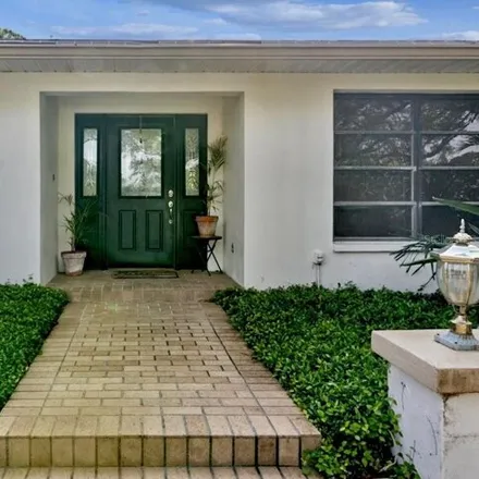 Buy this 5 bed house on 226 Normandy Circle West in Palm Harbor, FL 34683