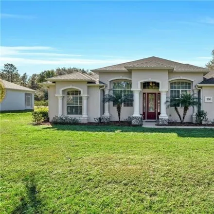 Buy this 4 bed house on 204 Hanging Moss Lane in Lady Lake, FL 32159