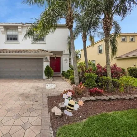 Buy this 4 bed house on 2810 Misty Oaks Circle in Royal Palm Beach, Palm Beach County
