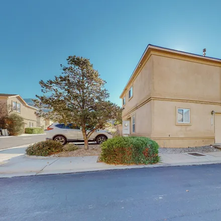 Buy this 3 bed house on 3153 Mountainside Parkway Northeast in Tramway Highpoint (HOA), Albuquerque