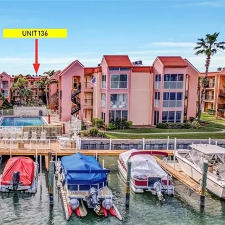 Buy this 1 bed condo on 9065 Captiva Circle in Saint Pete Beach, Pinellas County