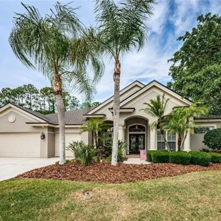 Buy this 4 bed house on 4600 Aylesford Drive in East Lake, FL 34685