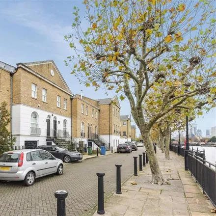 Rent this 3 bed townhouse on Sovereign Crescent in London, SE16 5XH
