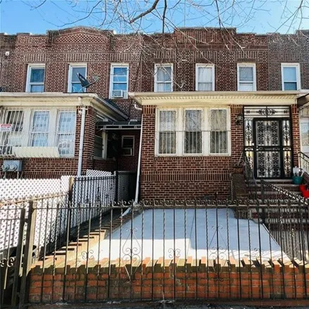 Buy this 3 bed house on 34-35 64th Street in New York, NY 11377