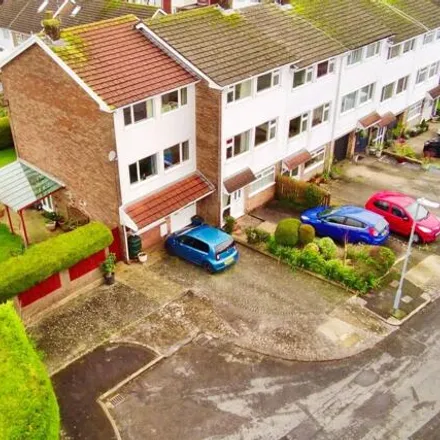 Buy this 4 bed townhouse on Summerland Close in Llandough, CF64 2QA