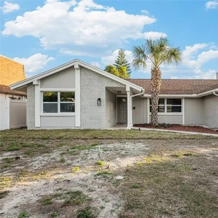 Buy this 3 bed house on 4076 Glissade Drive in Elfers, FL 34652