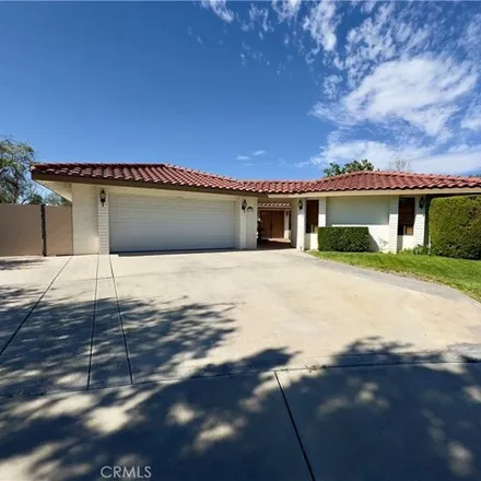 Rent this 3 bed house on 12998 Golf Course Drive in San Bernardino County, CA 92395