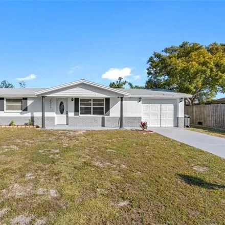 Buy this 2 bed house on 7283 Ashwood Drive in Bayonet Point, FL 34668
