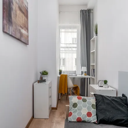 Rent this 5 bed room on Marshal Street 28 in 00-576 Warsaw, Poland