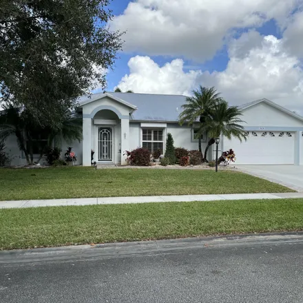 Rent this 3 bed house on 5017 4th Place in Indian River County, FL 32968