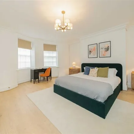 Rent this 2 bed townhouse on 58 Montagu Square in London, W1H 2LU