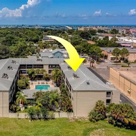 Buy this 2 bed condo on Publix in Valencia Boulevard, Belleair Bluffs