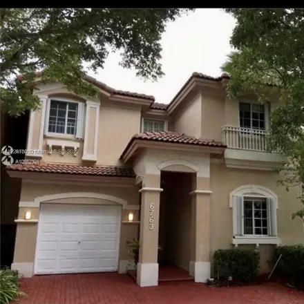 Buy this 4 bed house on 6763 Northwest 107th Place in Doral, FL 33178